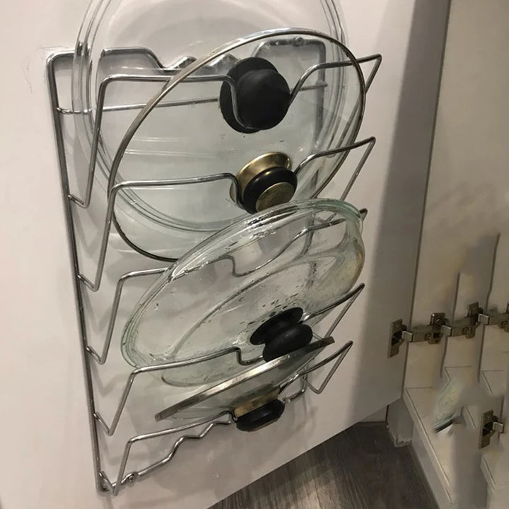 There is nowhere to put the pan lid, pan lid holder, kitchen organizer 1 pcs stainless steel arrived
Não tem onde colocar a tampa da panela chegou suporte tampa de panela, organizador cozinha 1 pçs  aço inoxidável