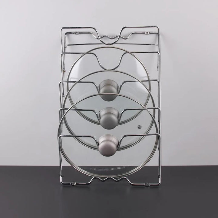 There is nowhere to put the pan lid, pan lid holder, kitchen organizer 1 pcs stainless steel arrived
Não tem onde colocar a tampa da panela chegou suporte tampa de panela, organizador cozinha 1 pçs  aço inoxidável